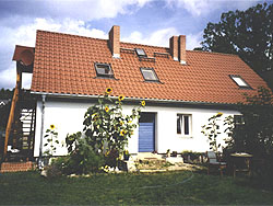 Ferienwohnung Kleinzerlang, Gartenseite